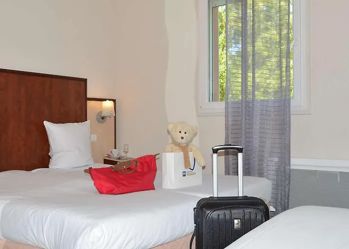 Sure By Western Reims Nord